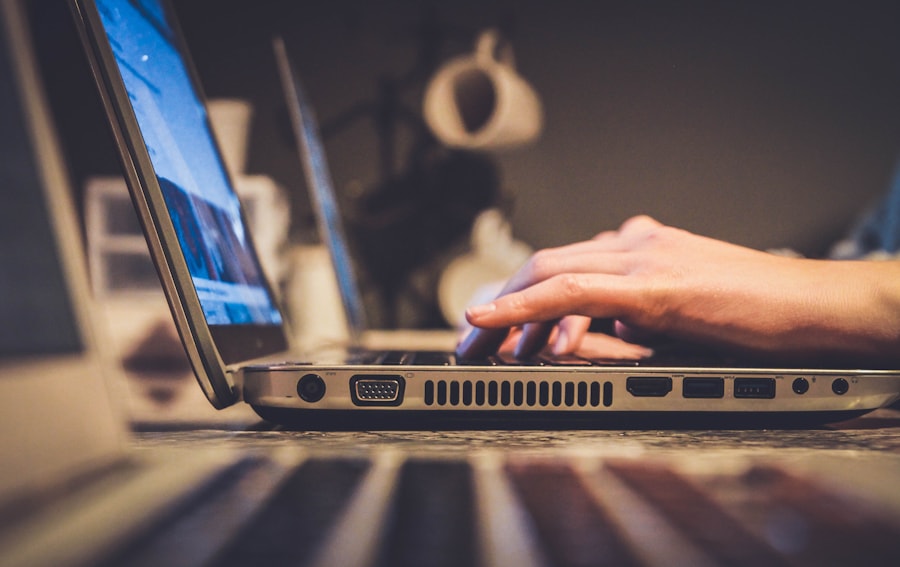 Person using a laptop for an accessible digital experience